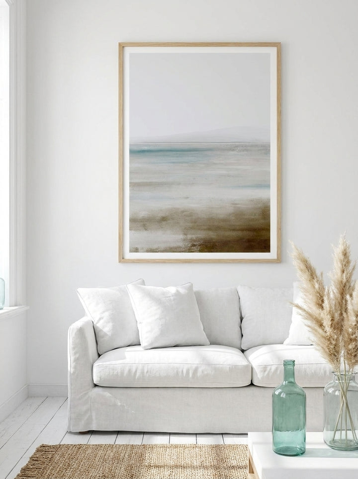 Modern wall art print styled on the wall in a coastal living room