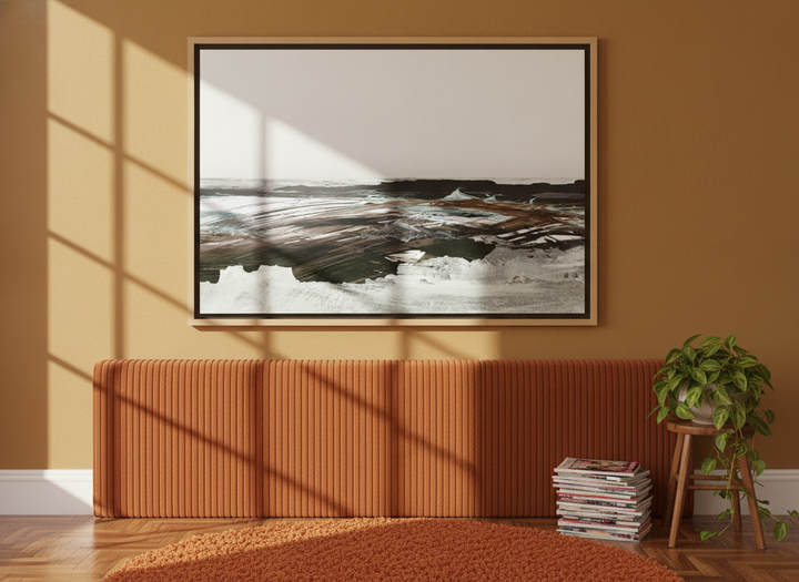 Canvas wall art with a natural timber surround styled on the wall in a retro 70s bedroom