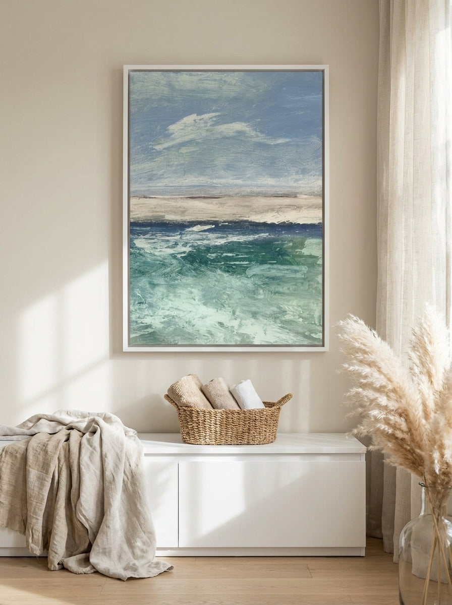 Canvas wall art with a white surround styled on the wall in a coastal bathroom