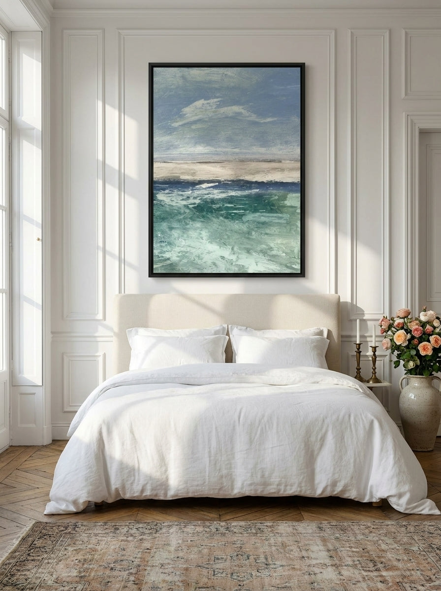 Canvas wall art with a black surround styled on the wall in a Parisian bedroom