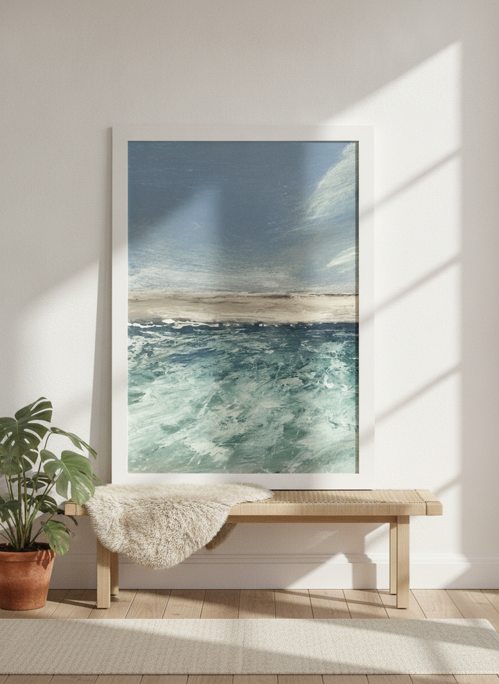 Modern wall art print standing on a bench in a bright Scandinavian bedroom