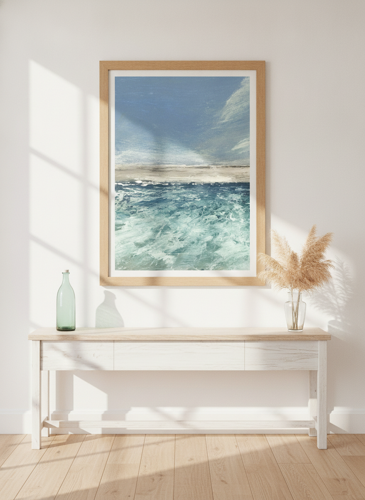 Modern wall art print styled on the wall in a coastal living room
