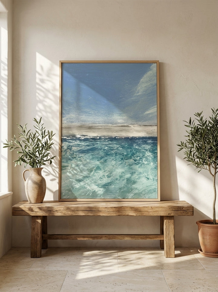 Modern wall art print standing on a bench in a Mediterranean home office