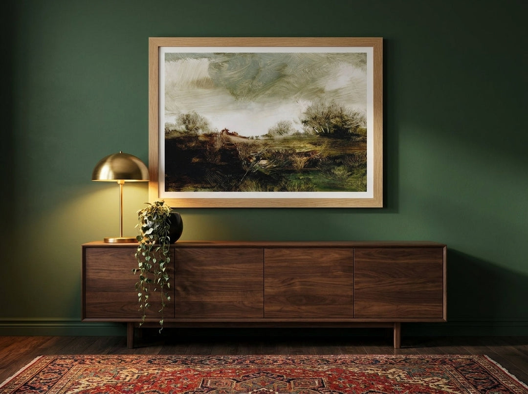 Modern wall art print styled on the wall in a moody living room