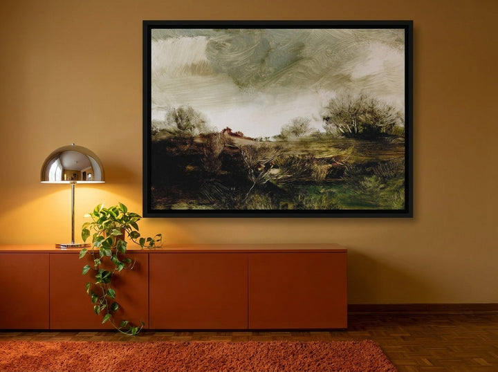 Oversized statement canvas wall art with a black surround styled on the wall in a retro 70s living room