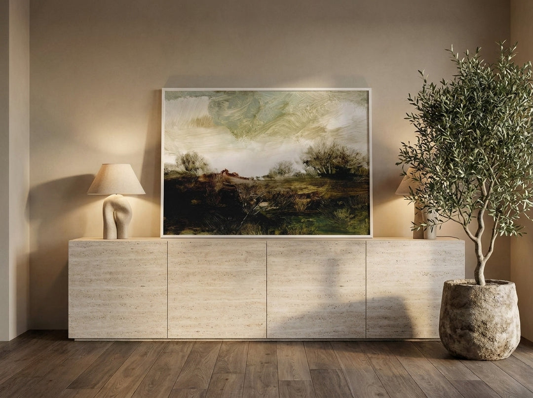 Modern wall art print standing on a console in a luxe home office