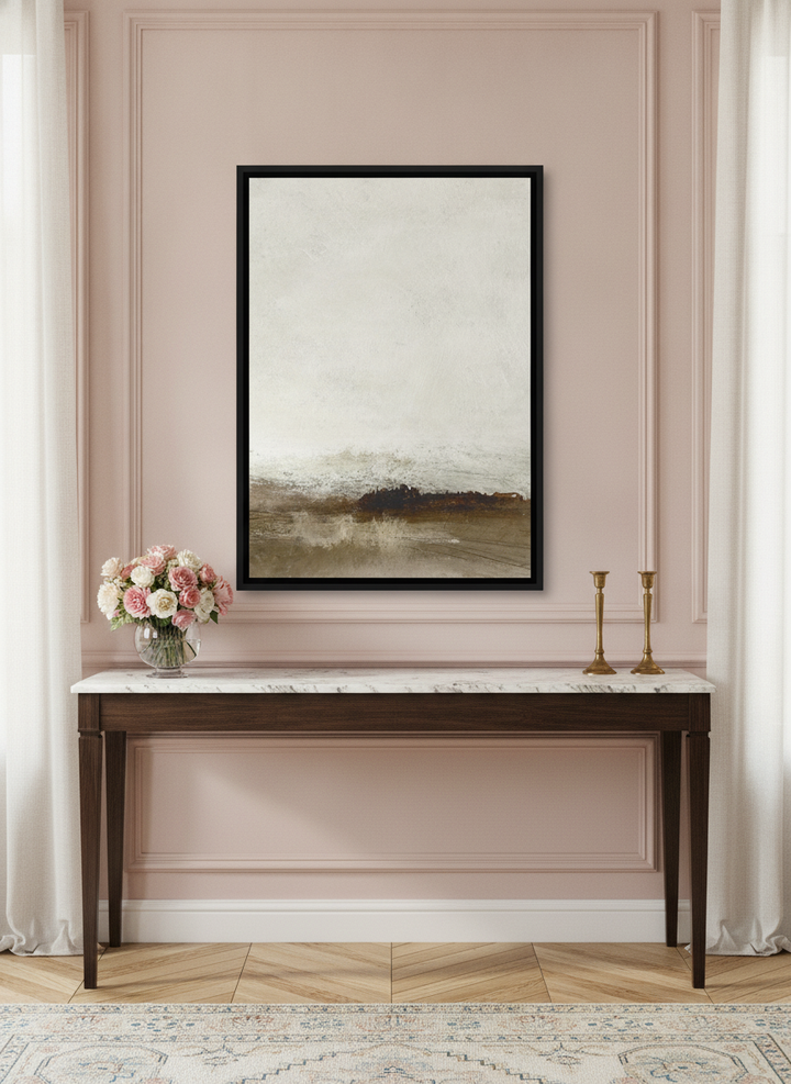 Canvas wall art with a black surround standing on a console in a Parisian living room