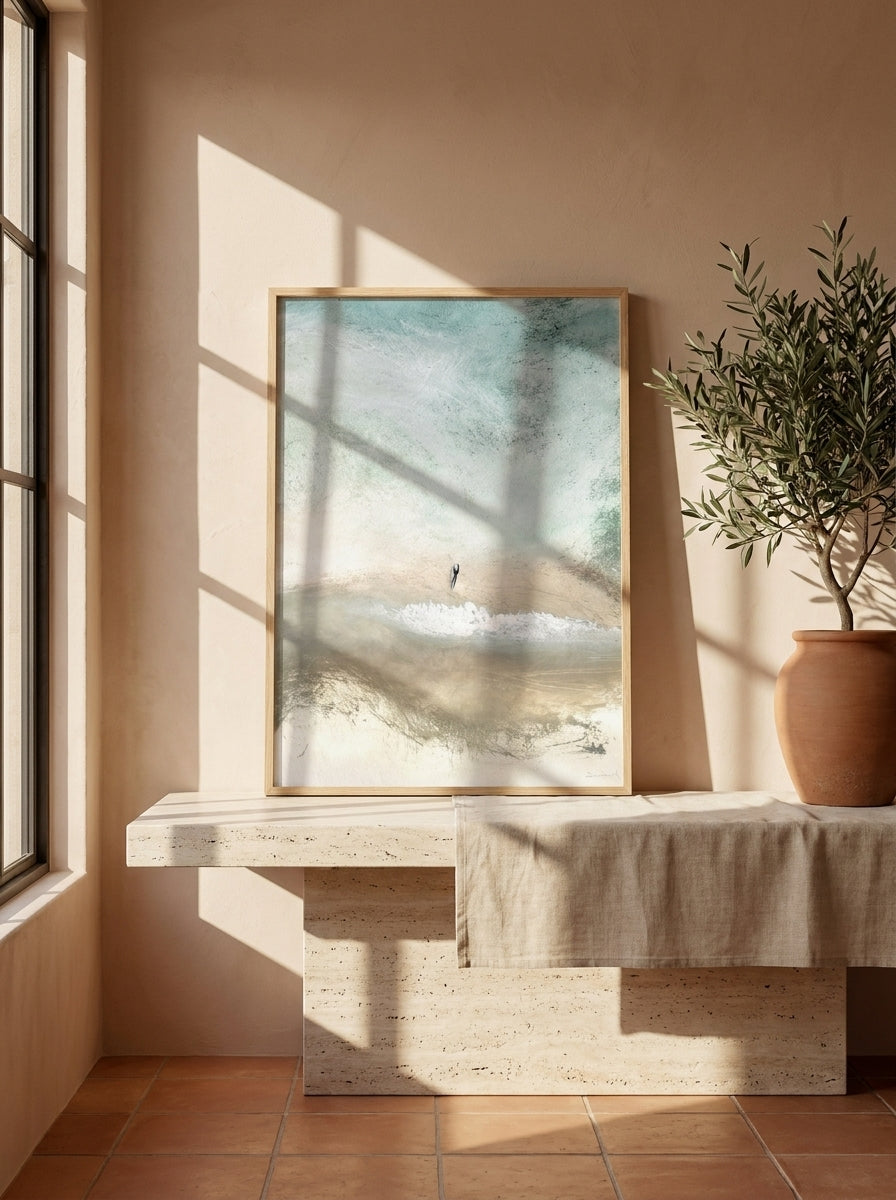 Modern wall art print standing on a console in a Mediterranean home office