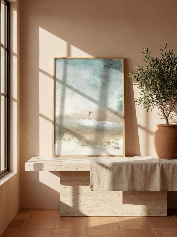 Modern wall art print standing on a console in a Mediterranean home office