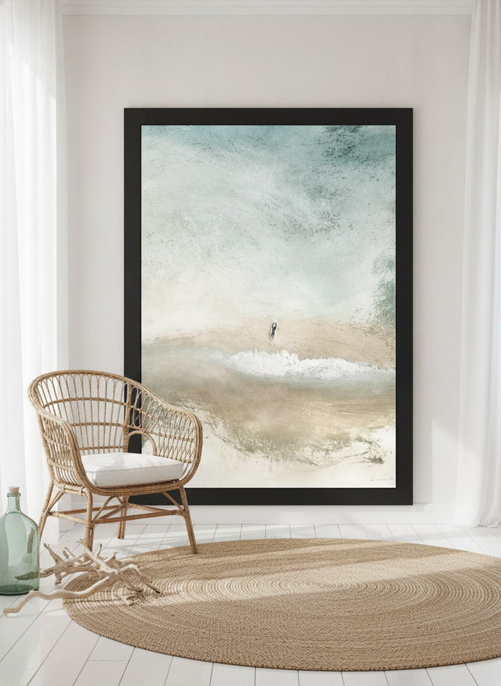 Oversized statement modern wall art print leaning against the wall in a coastal dining room