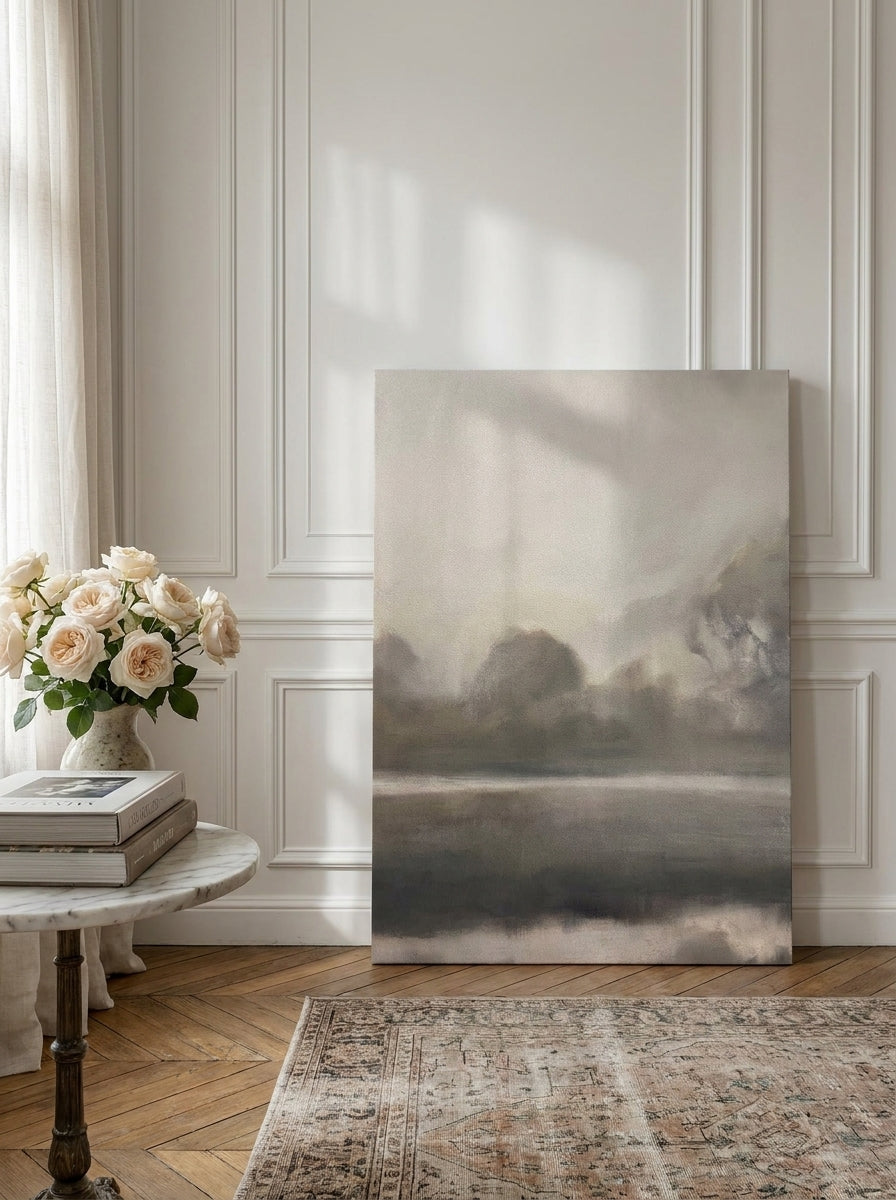 Stretched canvas wall art leaning against the wall in a Parisian home office