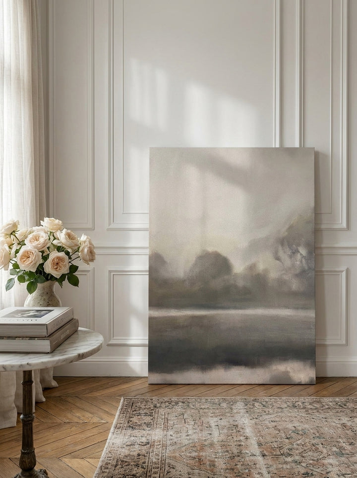 Stretched canvas wall art leaning against the wall in a Parisian home office