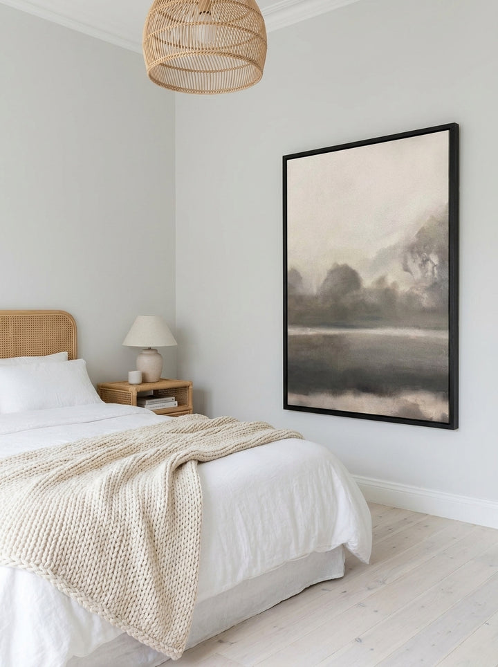 Oversized statement modern wall art print styled on the wall in a bright Scandinavian bedroom