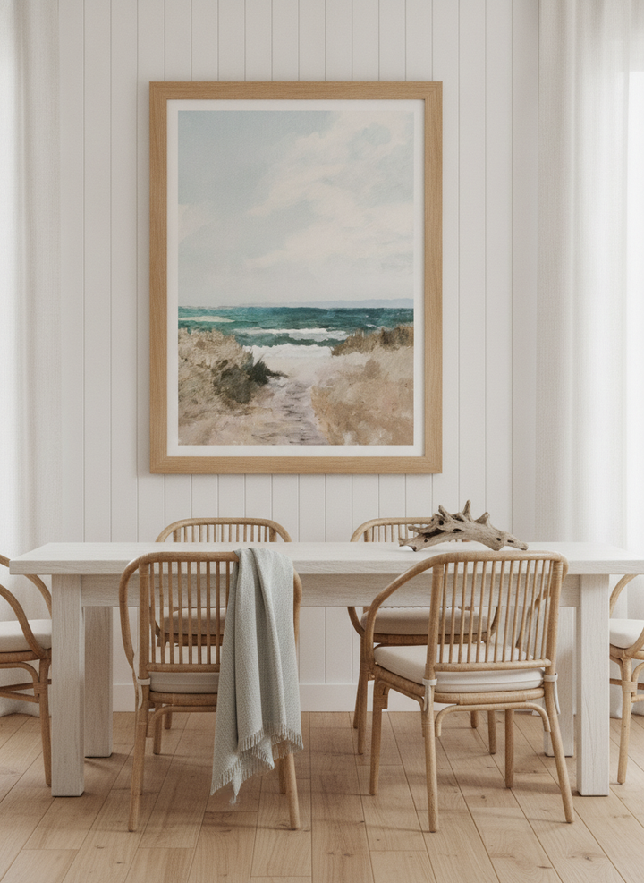 Modern wall art print styled on the wall in a coastal dining room