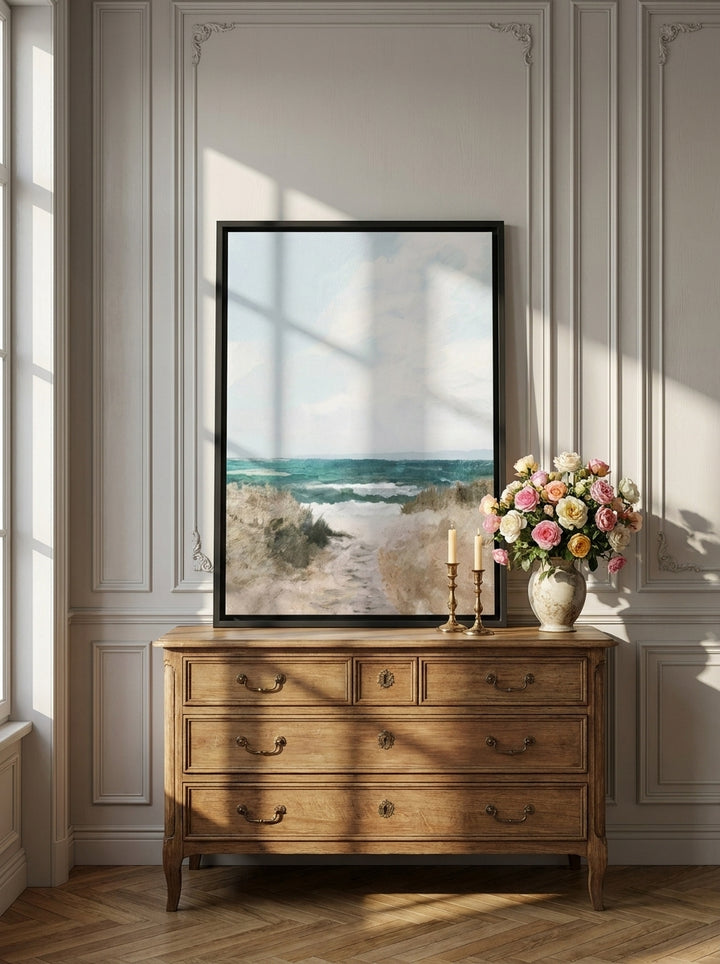 Canvas wall art with a black surround standing on a sideboard in a Parisian bathroom
