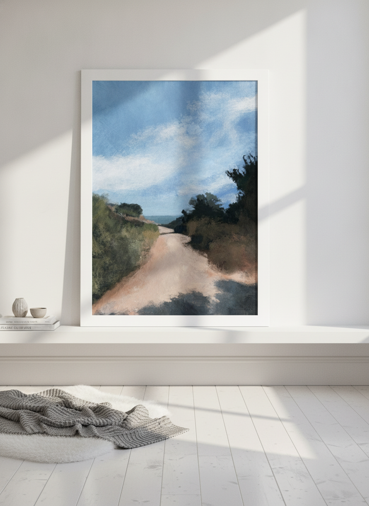Modern wall art print standing on a shelf in a bright Scandinavian home office