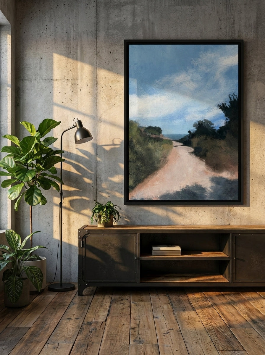 Canvas wall art with a black surround styled on the wall in an industrial loft living room