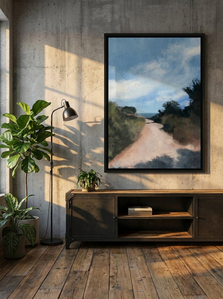 Canvas wall art with a black surround styled on the wall in an industrial loft living room