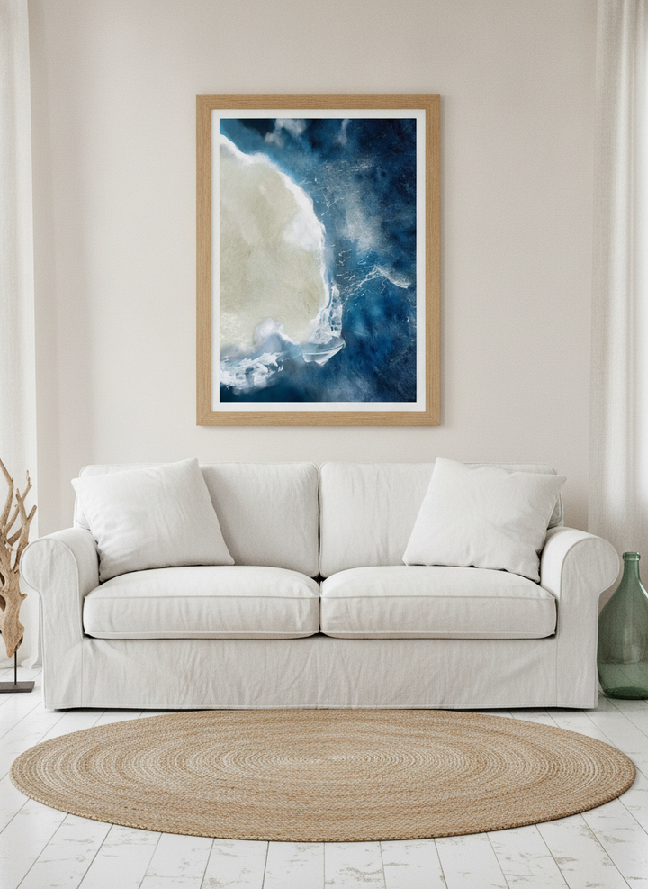 Modern wall art print styled on the wall in a coastal living room