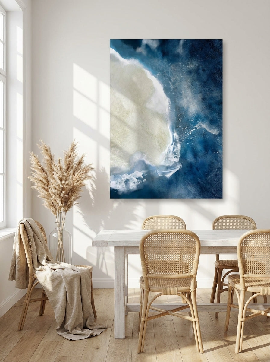 Stretched canvas wall art styled on the wall in a coastal dining room