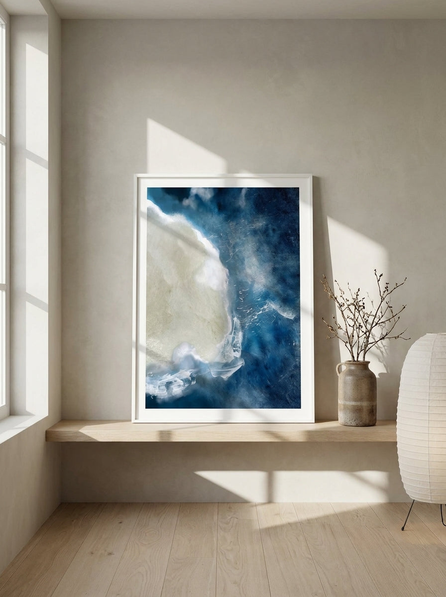 Modern wall art print standing on a shelf in a warm Japandi bedroom