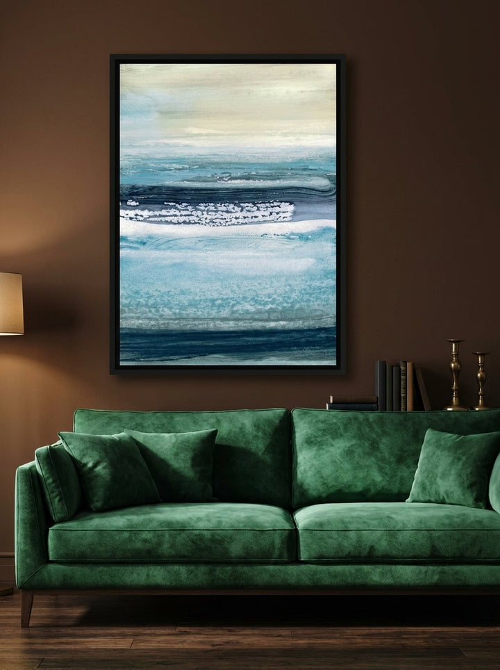 Oversized statement canvas wall art with a black surround styled on the wall in a moody living room