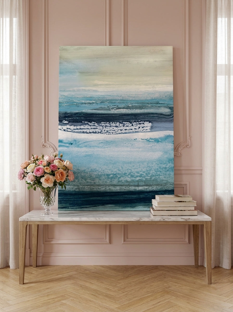 Stretched canvas wall art standing on a console in a Parisian bathroom