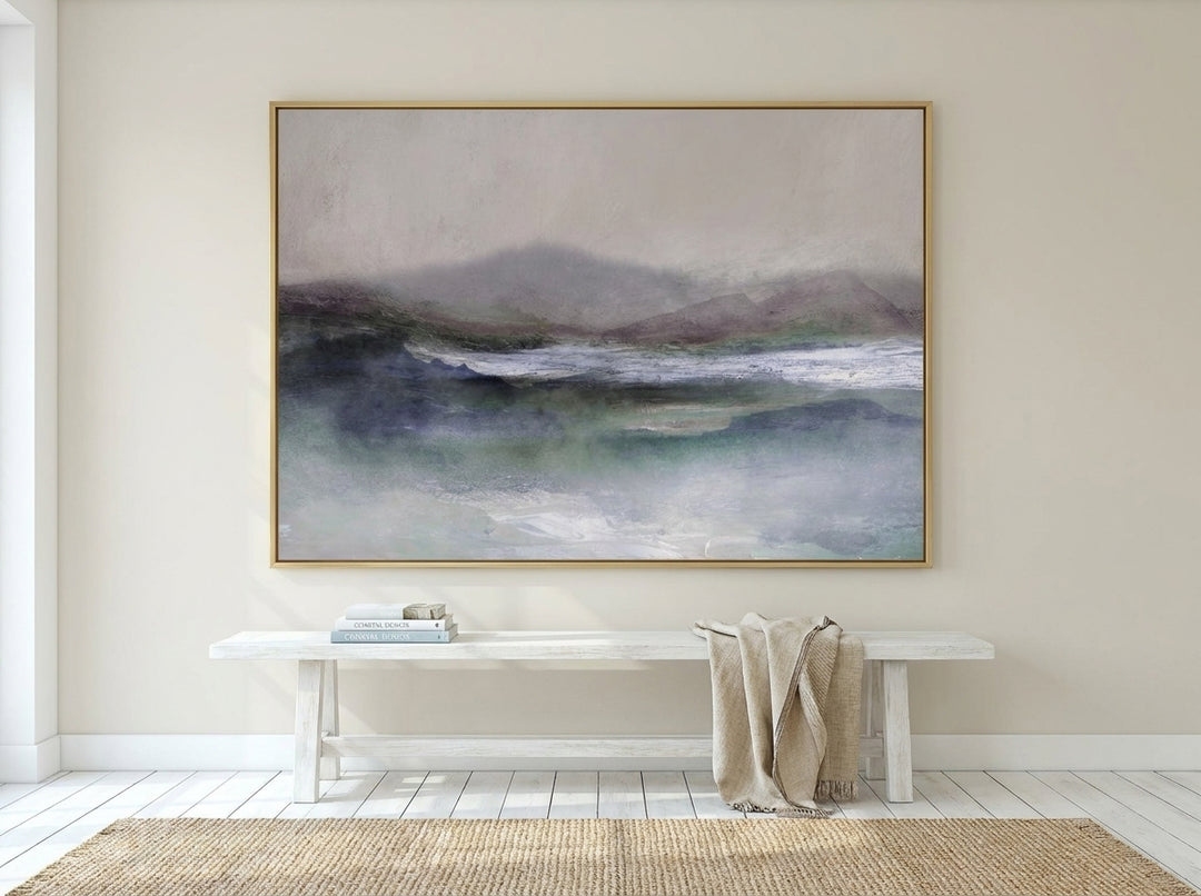 Oversized statement modern wall art print styled on the wall in a coastal living room