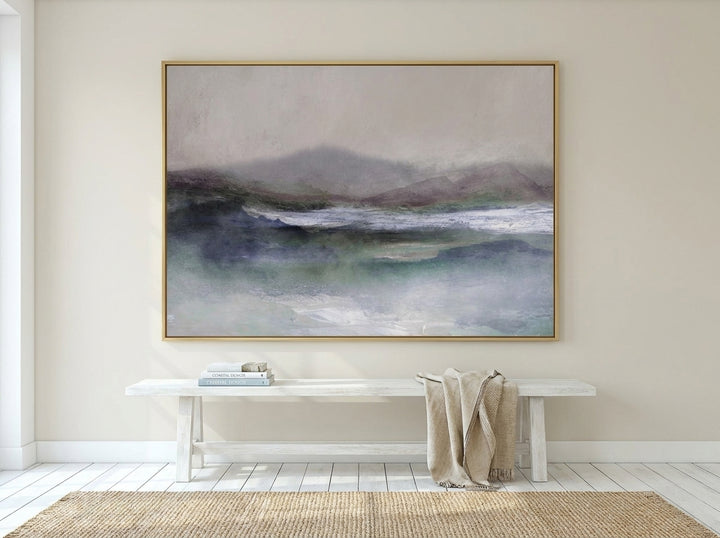 Oversized statement modern wall art print styled on the wall in a coastal living room