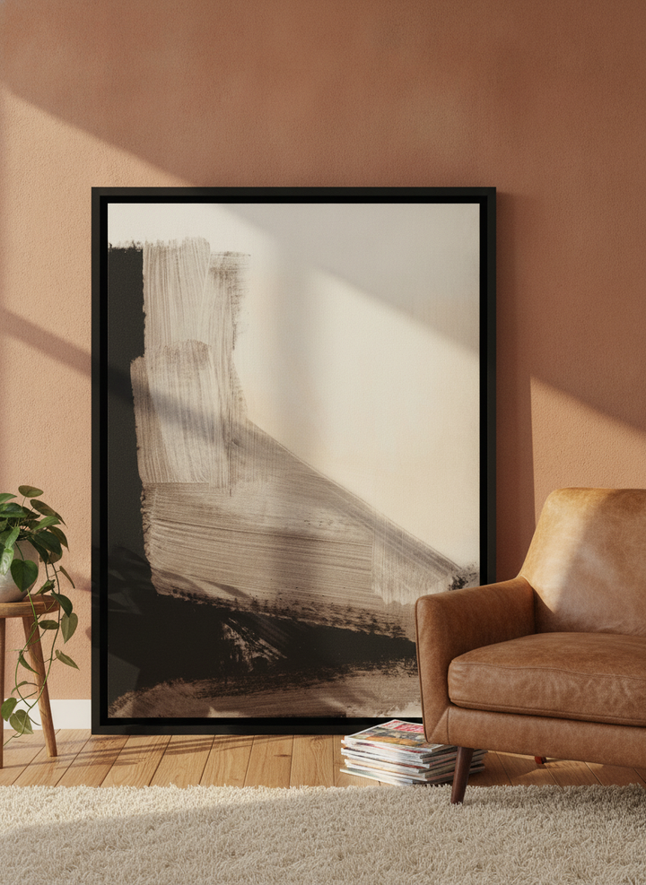 Canvas wall art with a black surround leaning against the wall in a retro 70s living room