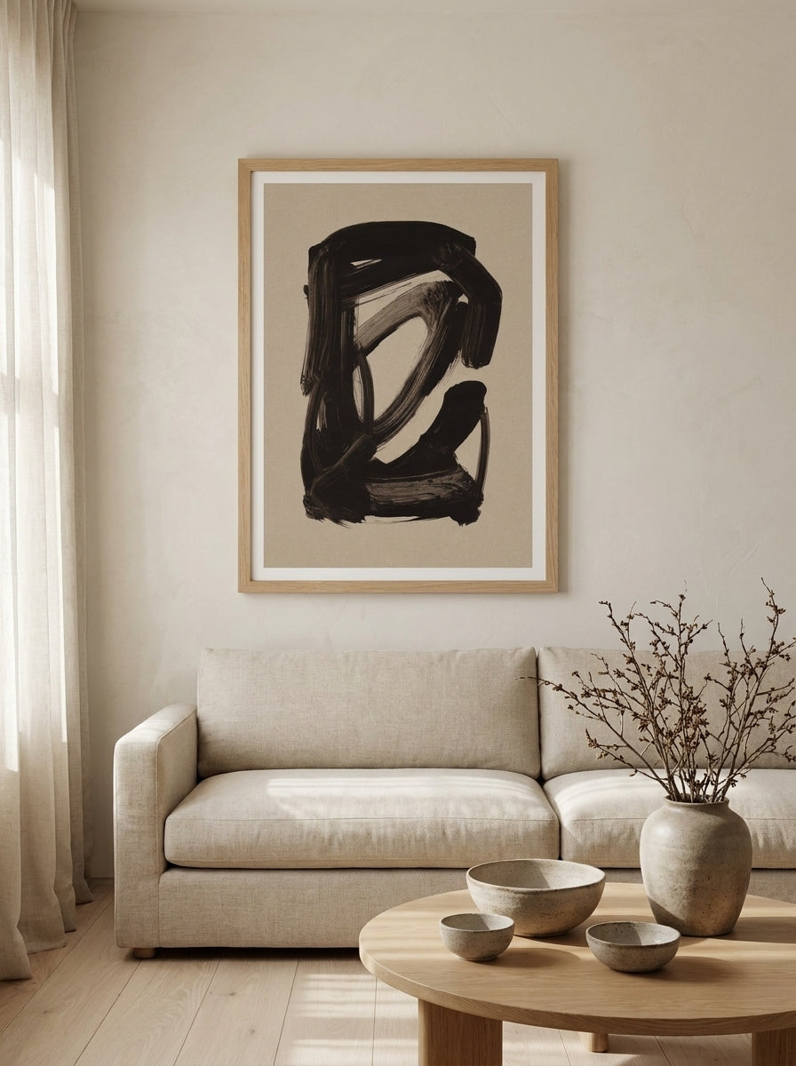 Modern wall art print styled on the wall in a warm Japandi living room