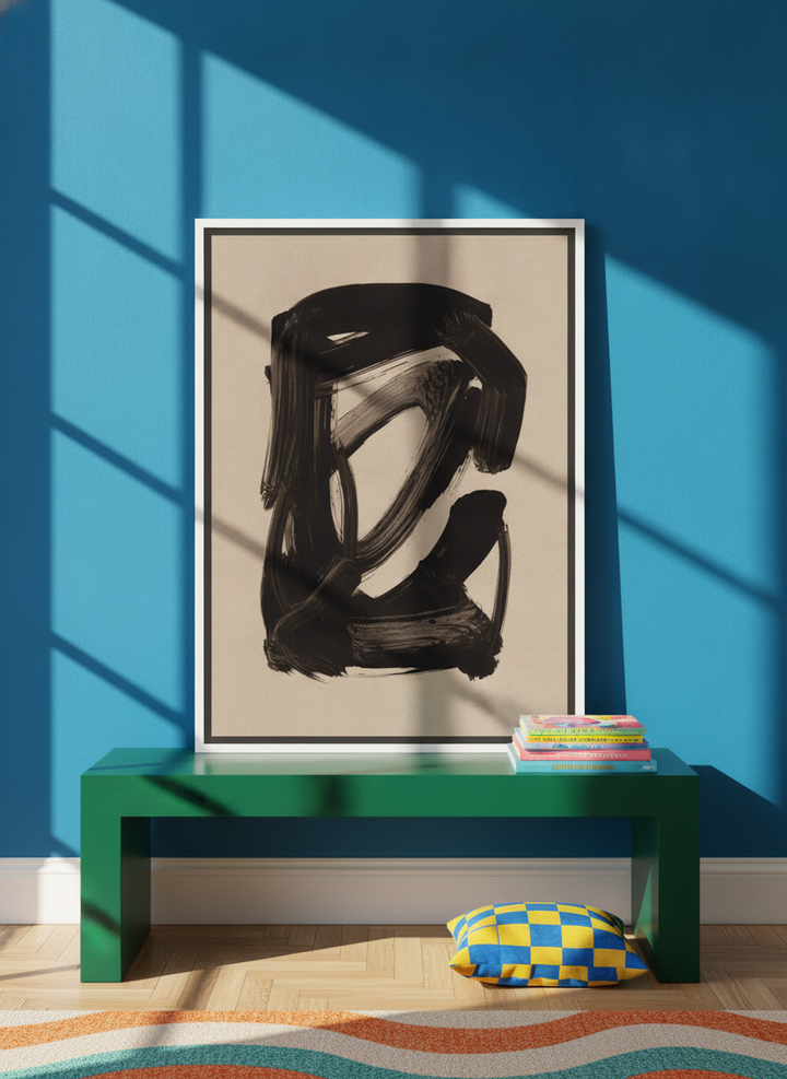 Canvas wall art with a white surround standing on a side table in a colourful eclectic home office