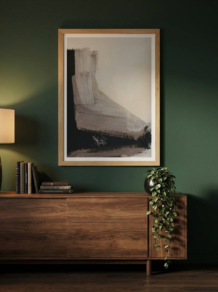 Modern wall art print styled on the wall in a moody living room