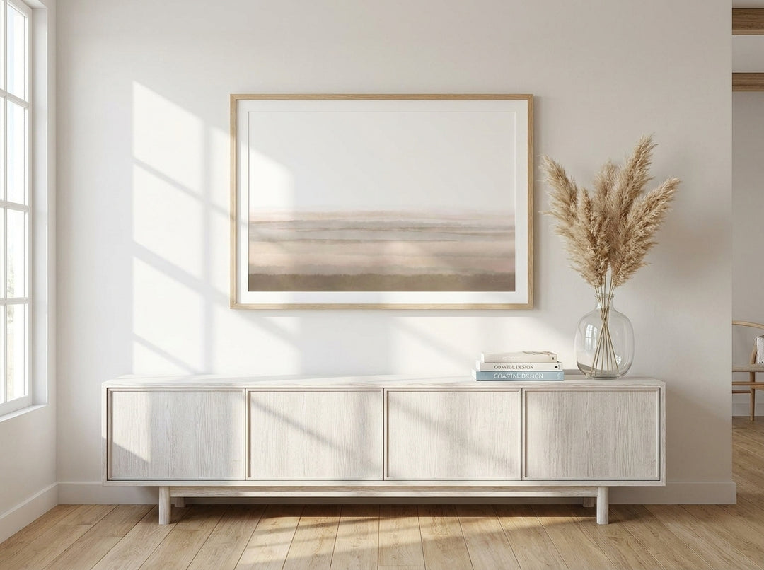 Modern wall art print styled on the wall in a coastal living room