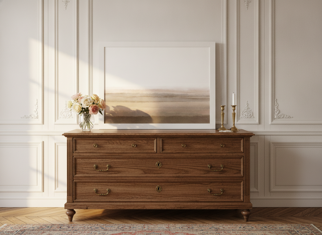 Modern wall art print standing on a sideboard in a Parisian bedroom