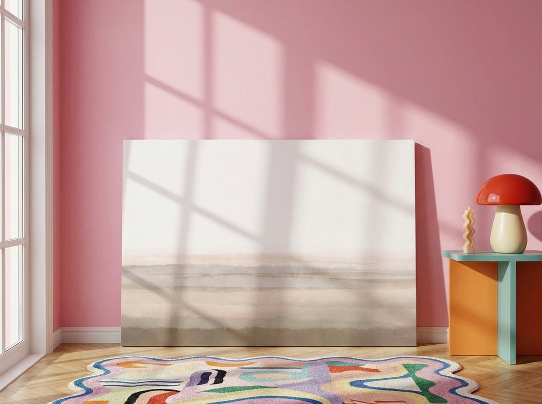 Stretched canvas wall art leaning against the wall in a colourful eclectic home office