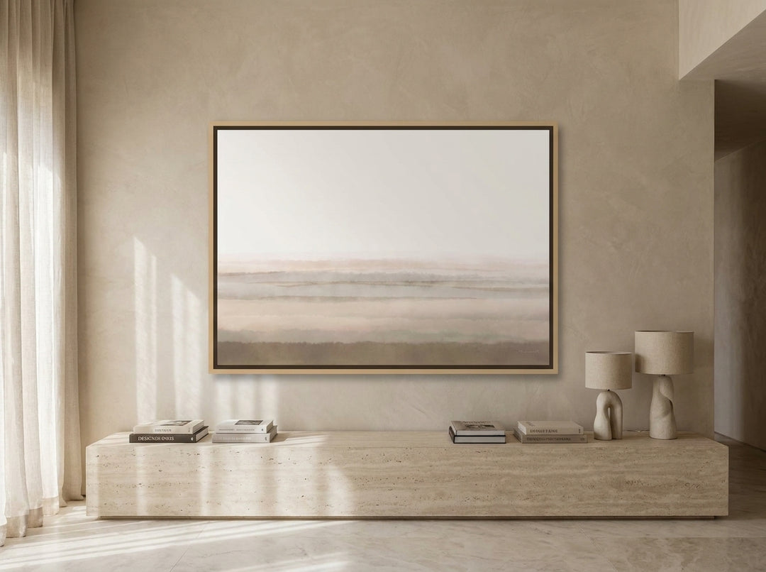 Oversized statement canvas wall art with a natural timber surround styled on the wall in a luxe living room