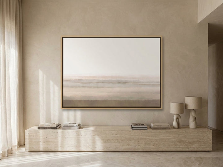 Oversized statement canvas wall art with a natural timber surround styled on the wall in a luxe living room