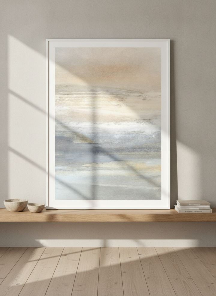 Modern wall art print standing on a shelf in a warm Japandi bathroom