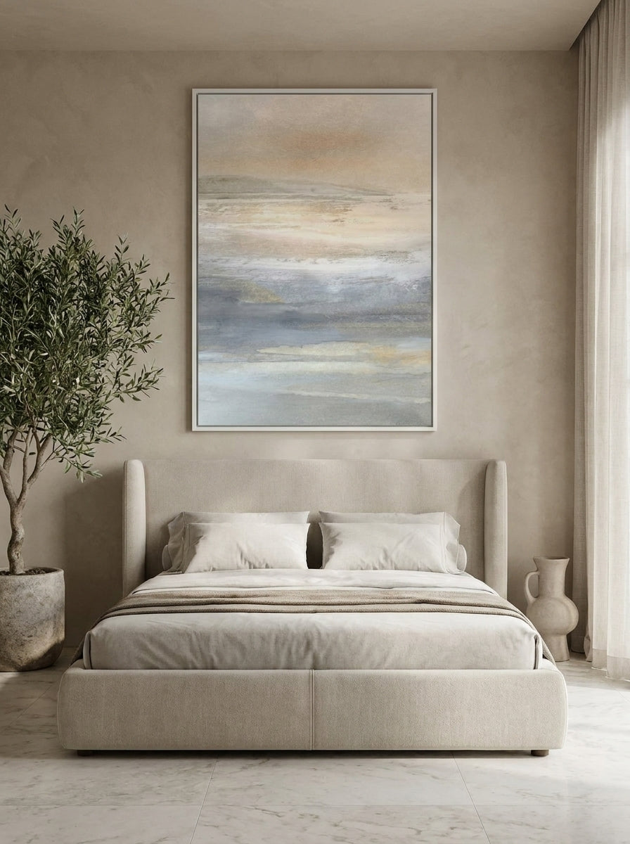 Oversized statement canvas wall art with a white surround styled on the wall in a luxe bedroom