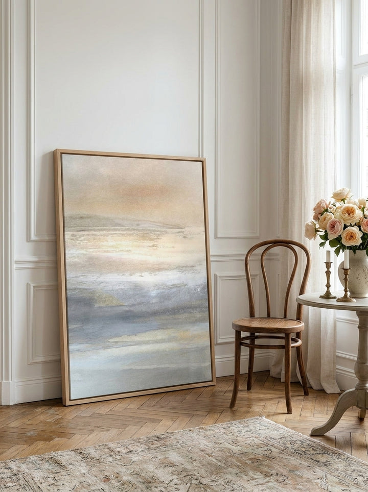 Canvas wall art with a natural timber surround leaning against the wall in a Parisian bathroom