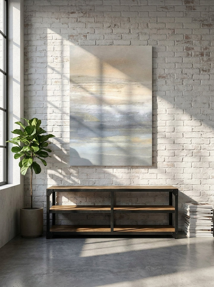 Stretched canvas wall art styled on the wall in an industrial loft living room