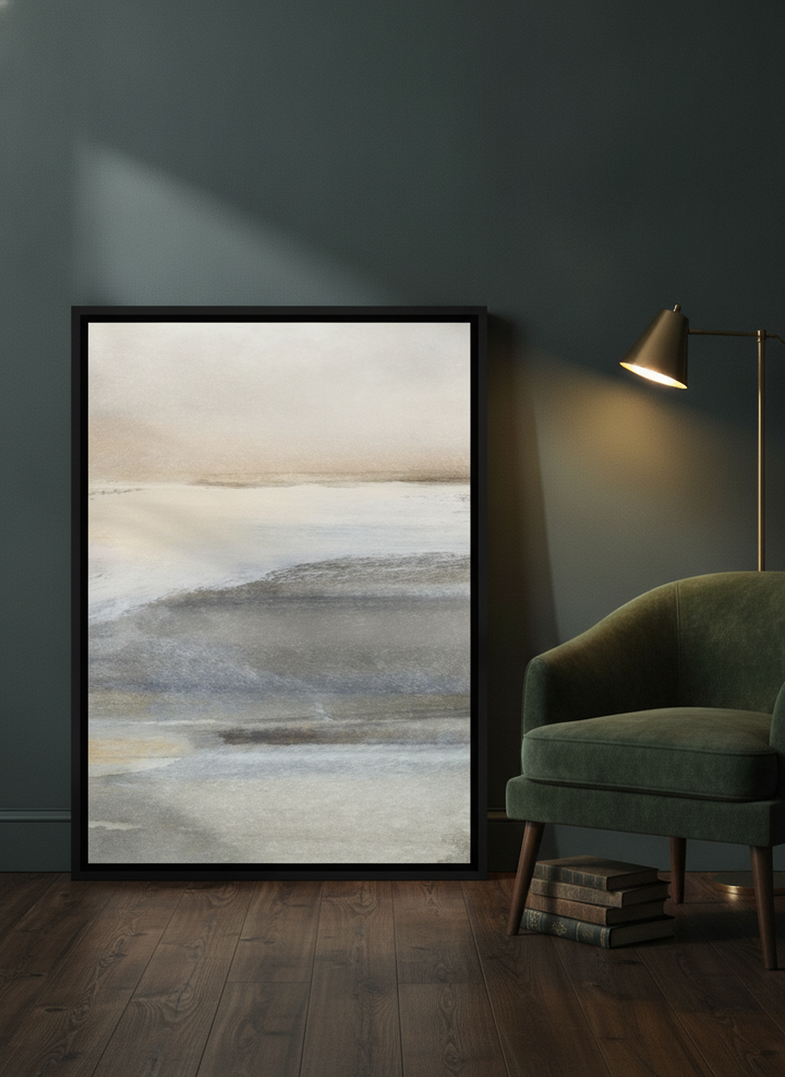 Canvas wall art with a black surround leaning against the wall in a moody home office