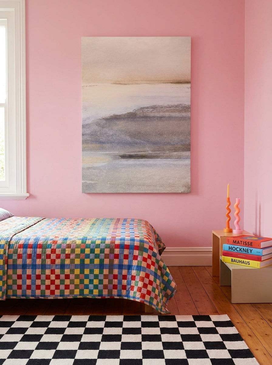 Stretched canvas wall art styled on the wall in a colourful eclectic bedroom
