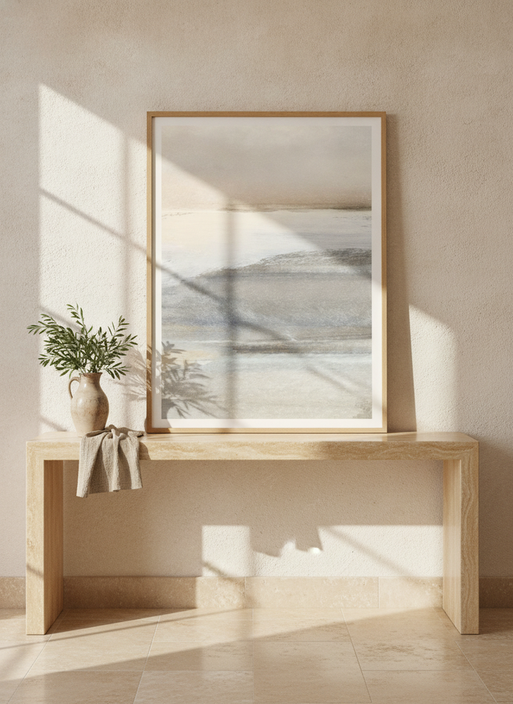 Modern wall art print standing on a console in a Mediterranean home office