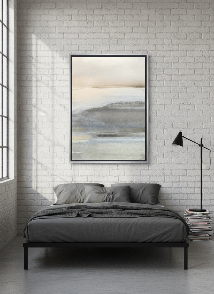 Canvas wall art with a silver leaf surround styled on the wall in an industrial loft bedroom