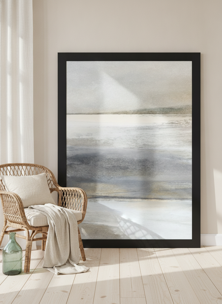 Oversized statement modern wall art print leaning against the wall in a coastal dining room