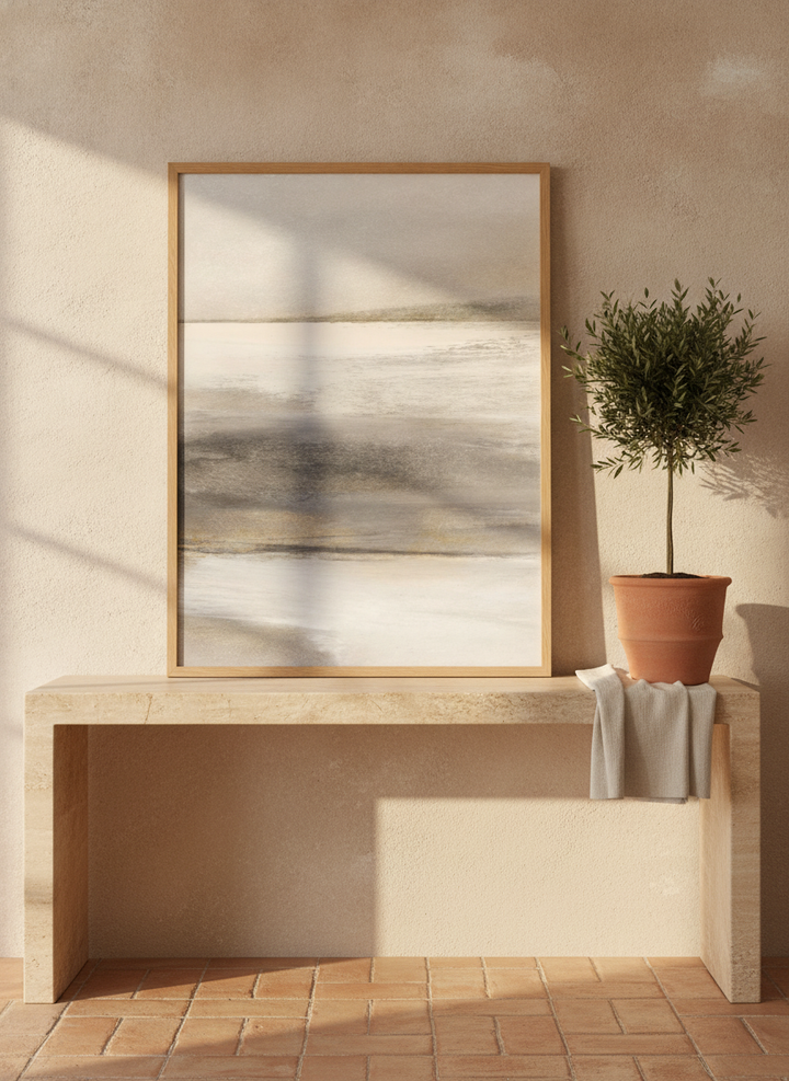 Modern wall art print standing on a console in a Mediterranean home office