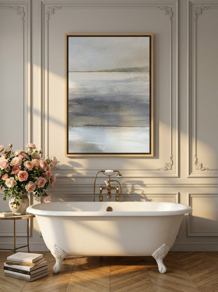 Canvas wall art with a natural timber surround styled on the wall in a Parisian bathroom