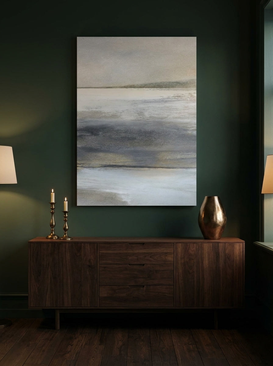 Stretched canvas wall art styled on the wall in a moody living room